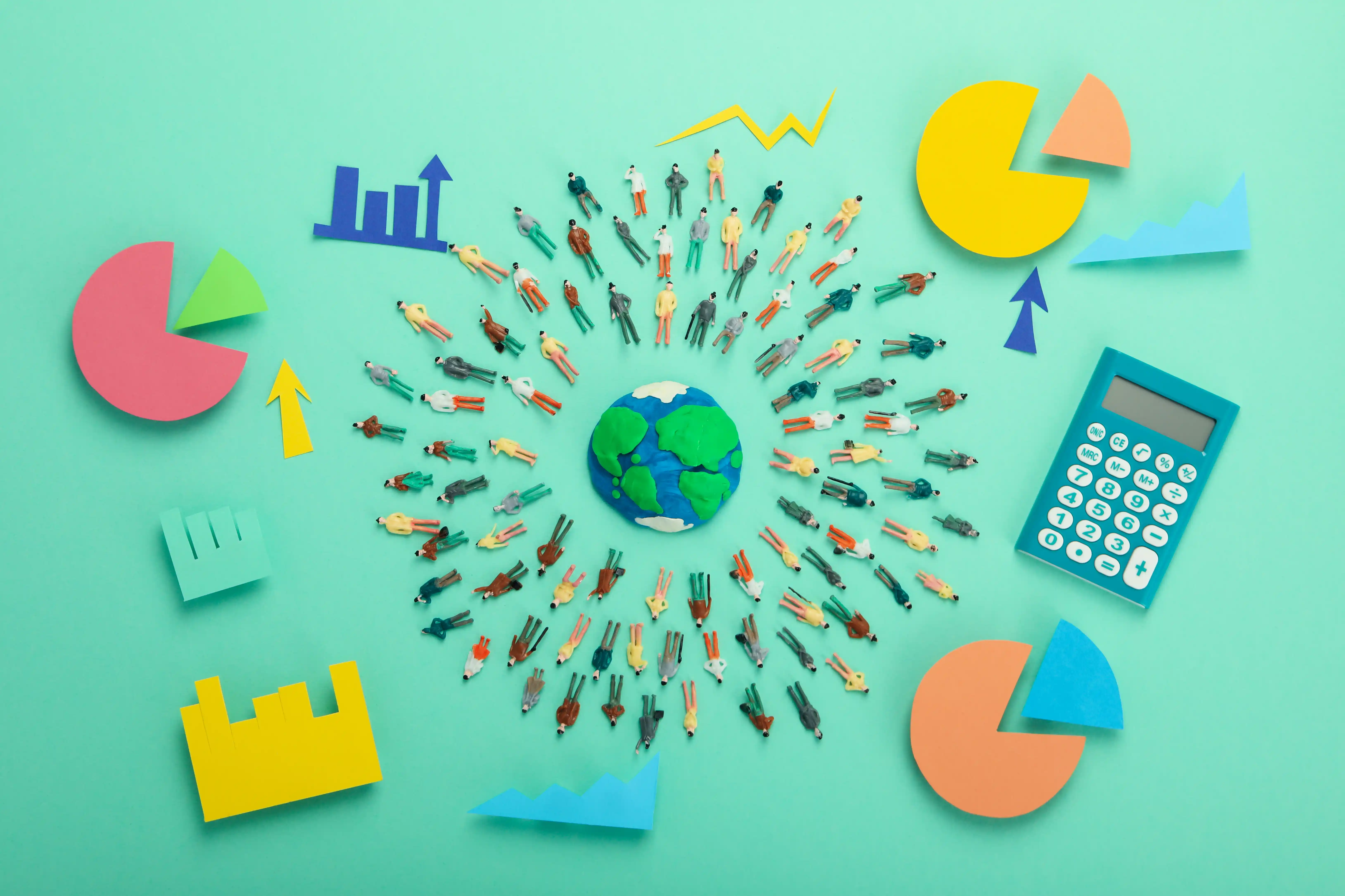 Audience and data paper cutouts arranged around a globe